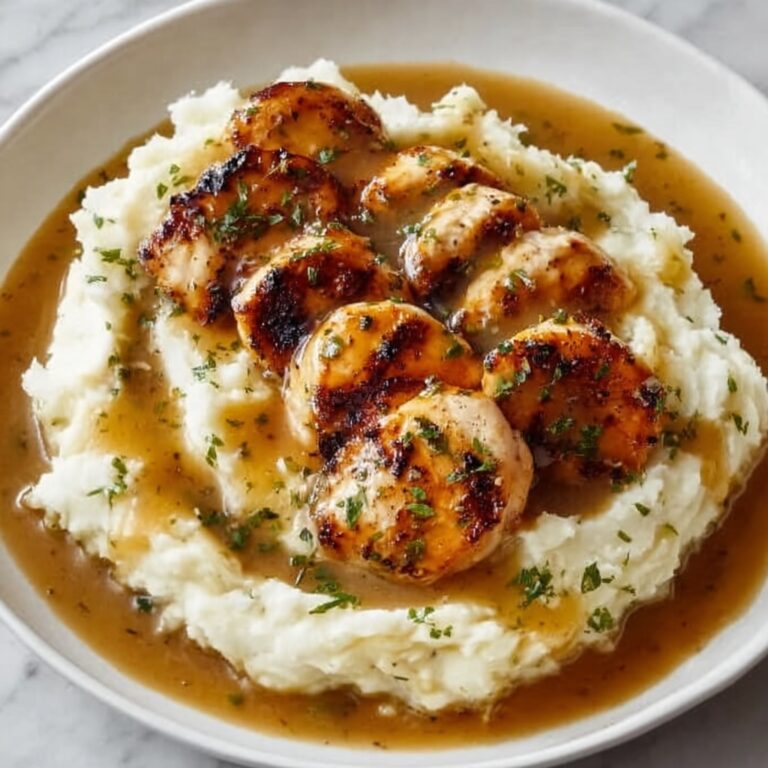 Savory Chicken and Garlic Gravy with Cheesy Mashed Potatoes Recipe